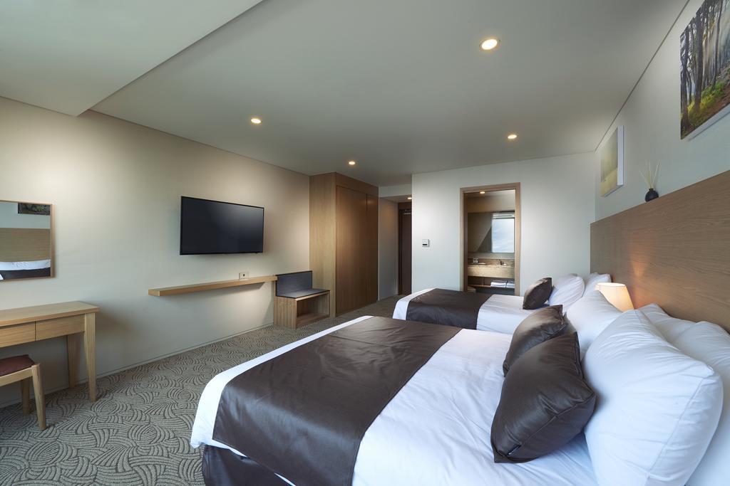 Benikea Jungmun Hotel Seogwipo Værelse billede
